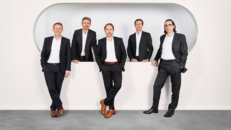 A group photo shows the EOS Board of Directors (from left to right): Andreas Kropp (Germany), Justus Hecking-Veltman (CFO), Marwin Ramcke (CEO), Carsten Tidow (Eastern Europe) and Dr. Andreas Witzig (Western Europe).
